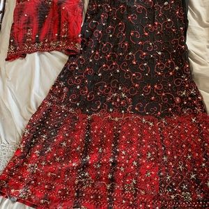 Red and black lehngha with sequins